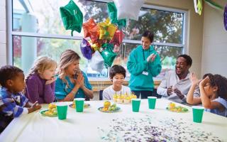 kids and parents at birthday party