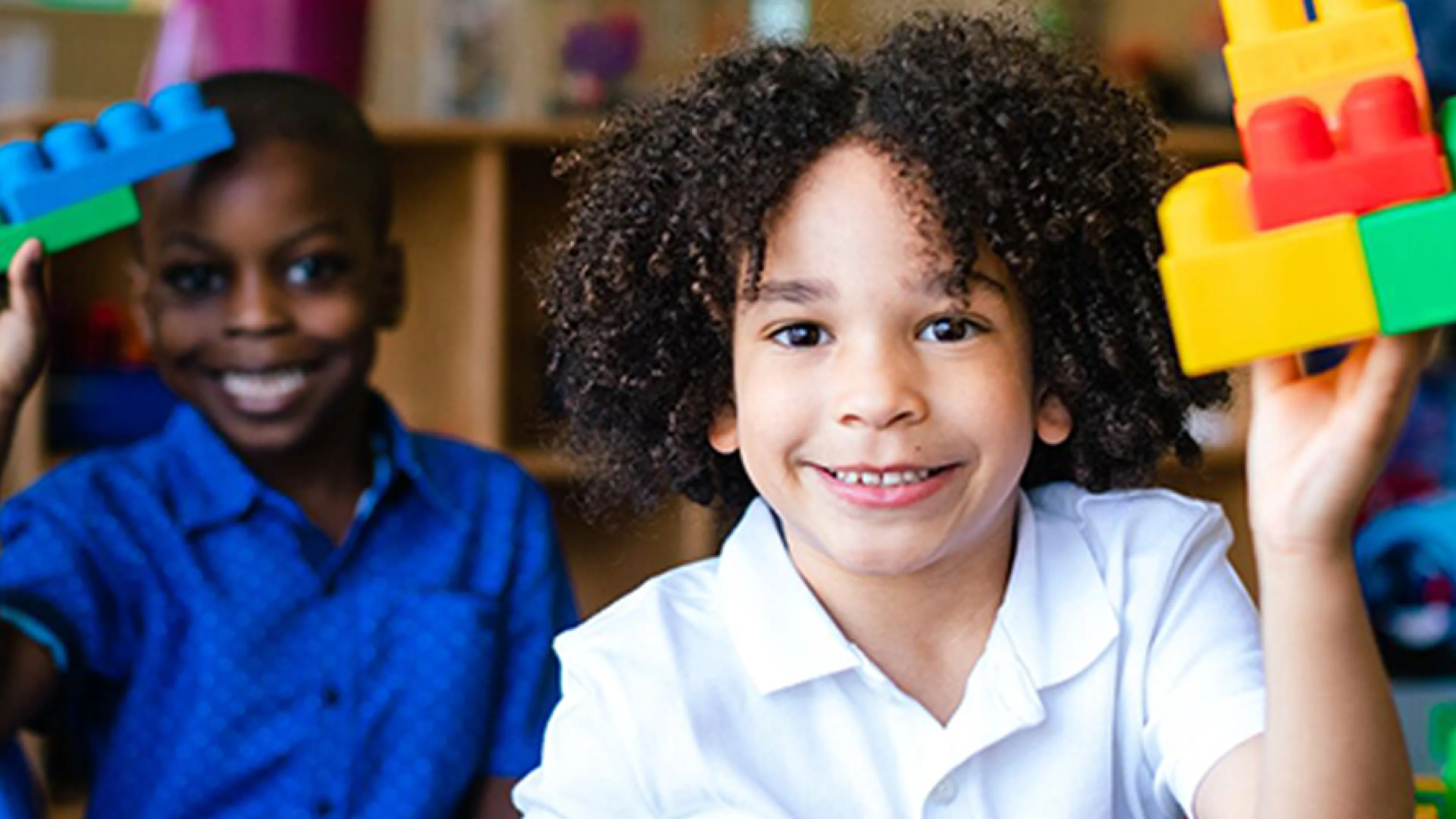 Two children building lego's at Preschool.