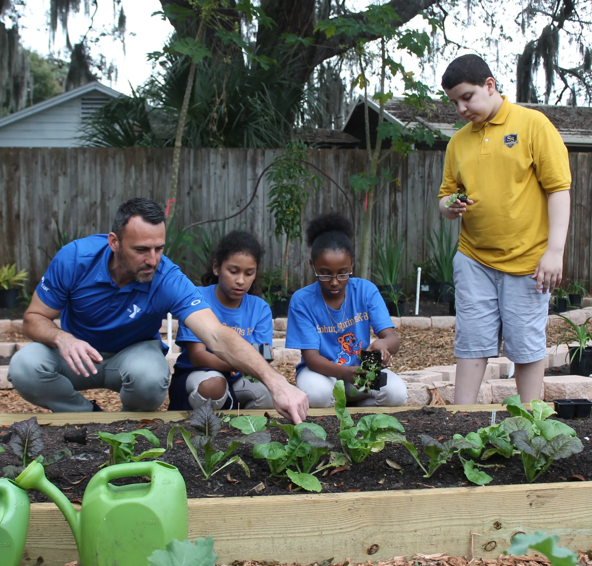 Matt with SS kids in garden