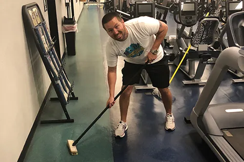 Y staff person cleaning