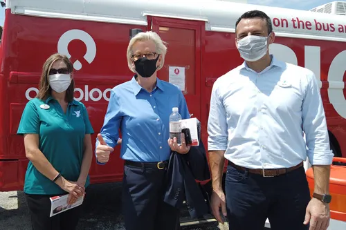 Tampa mayor Jane Castor with Tampa Y CEO Matt Mitchell and VP Marketing Jennifer Wainman in front of OneBlood bus