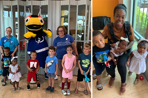 left photo Tampa Bay Lightning bug posing with little learners participants. right photo: mom with two small children and holding a baby