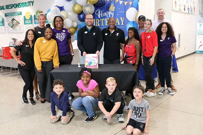 Multiple Spurlino YMCA staff, members and campers celebrate the Y’s 5th Anniversary. 