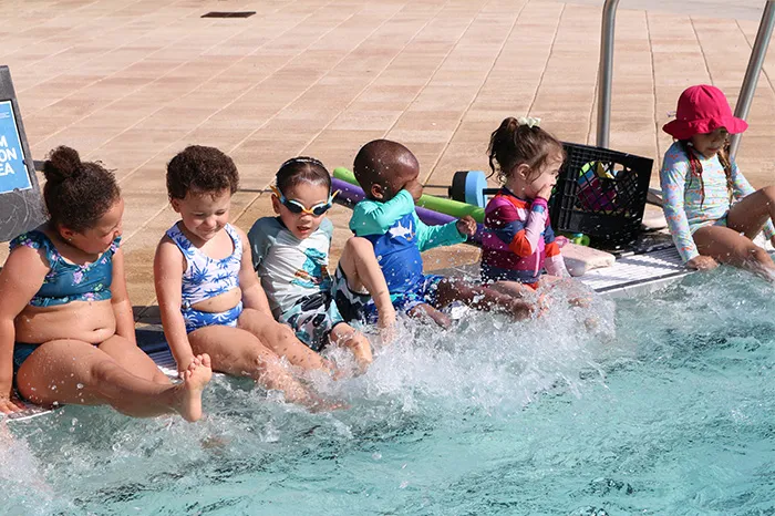 Children enjoying water safety classes at the Tampa Y.