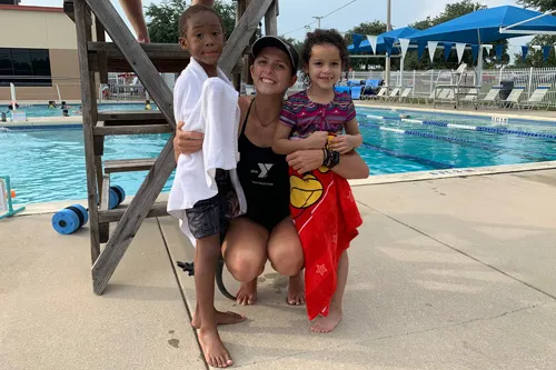 https://www.tampaymca.org/wp-content/uploads/2019/08/Meghan-Sadowski-with-CJ-and-Arianna1.jpg
