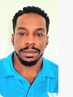 headshot of male personal trainer wearing blue polo and with white background