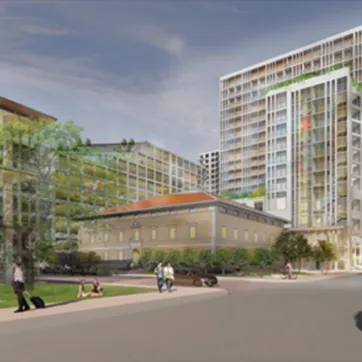 Rendering of development project in Tampa Heights including current and new buildings.View is from N Florida Ave. and E Oak Ave. The graphic shows people walking on side walks.
