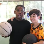 Two basketball players at the Spurlino Y.